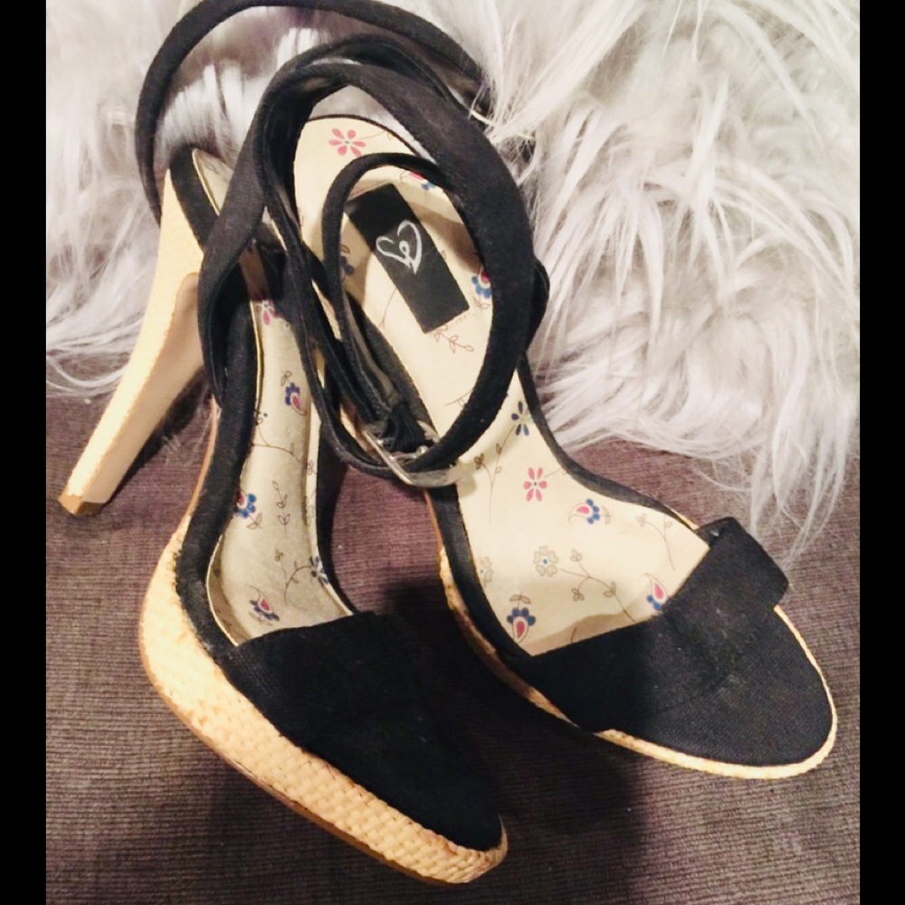 Black canvas shoes with wicker heels